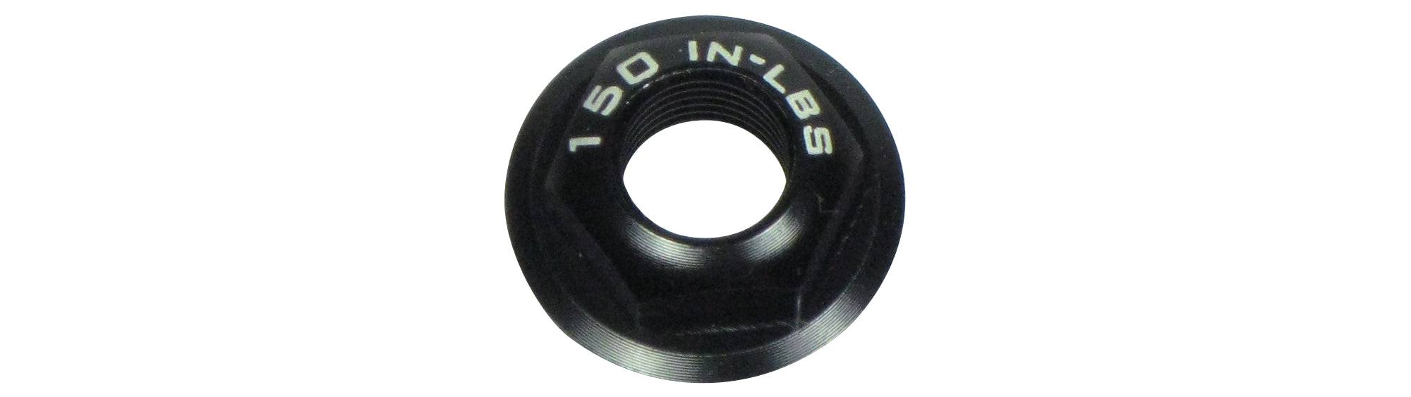 Black Trek Rocker Pivot Nut M10 x 6mm, a suspension frame support component, shown in close-up.