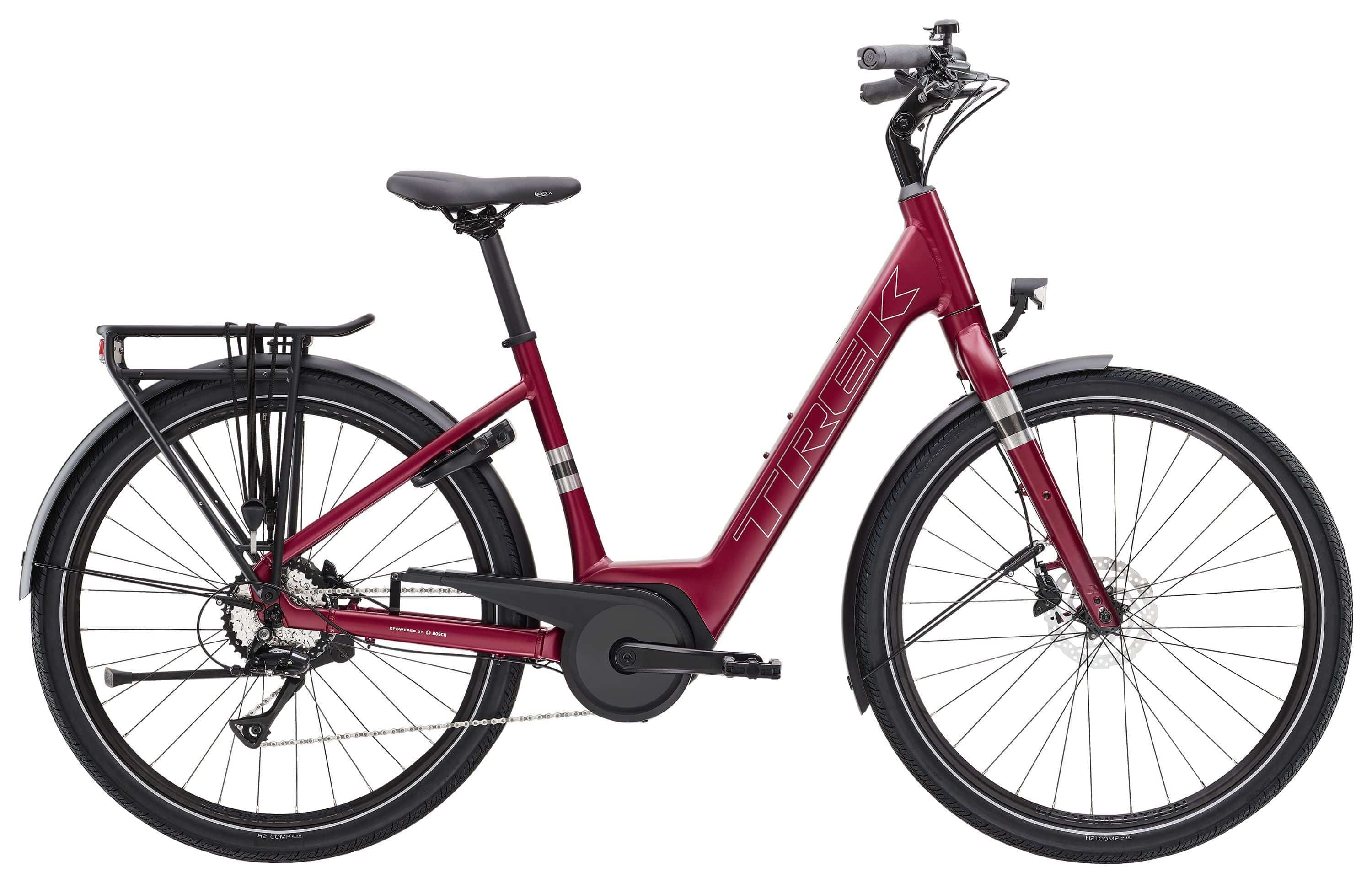 Trek Verve+ 1 Lowstep women's electric hybrid bike with comfortable seat and step-through frame, ready for an assisted ride.