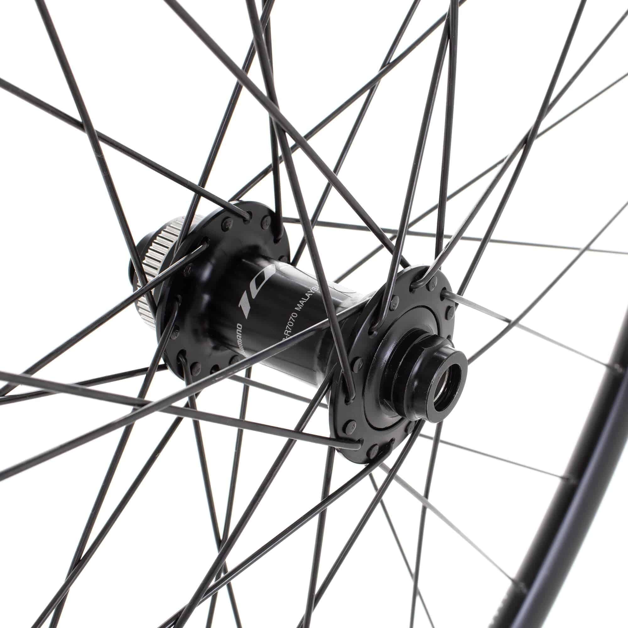 Black M Part Wheels road front disc wheel with Shimano 105 CL hub, 100x12mm axle, DT R 470 rim, 700c size.