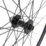 Black M Part Wheels road front disc wheel with Shimano 105 CL hub, 100x12mm axle, DT R 470 rim, 700c size.