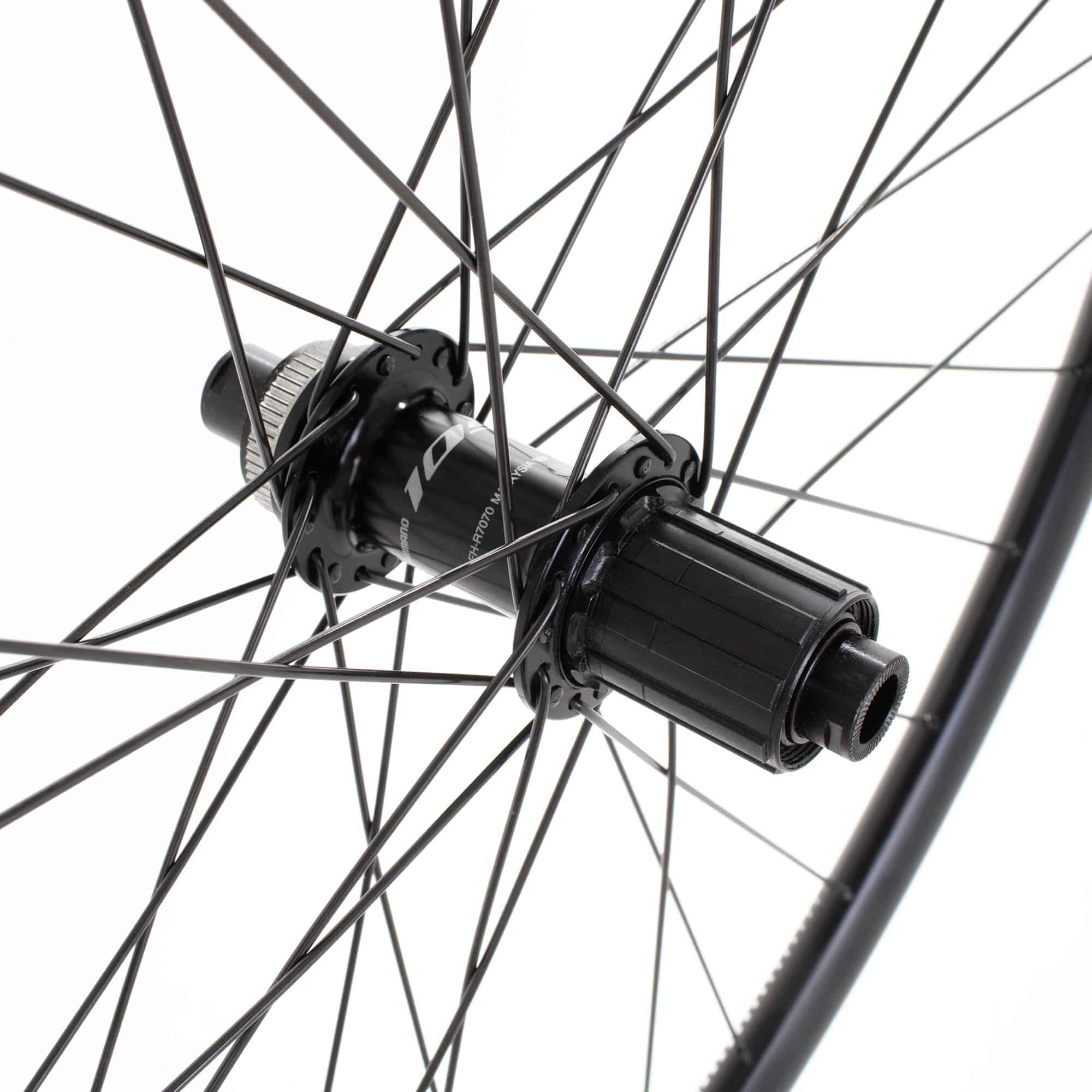 Black M Part Wheels road rear disc wheel with Shimano 105 hub, 142x12mm DT R 470 rim, 700c size, for cycling components.