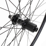 Black M Part Wheels road rear disc wheel with Shimano 105 hub, 142x12mm DT R 470 rim, 700c size, for cycling components.