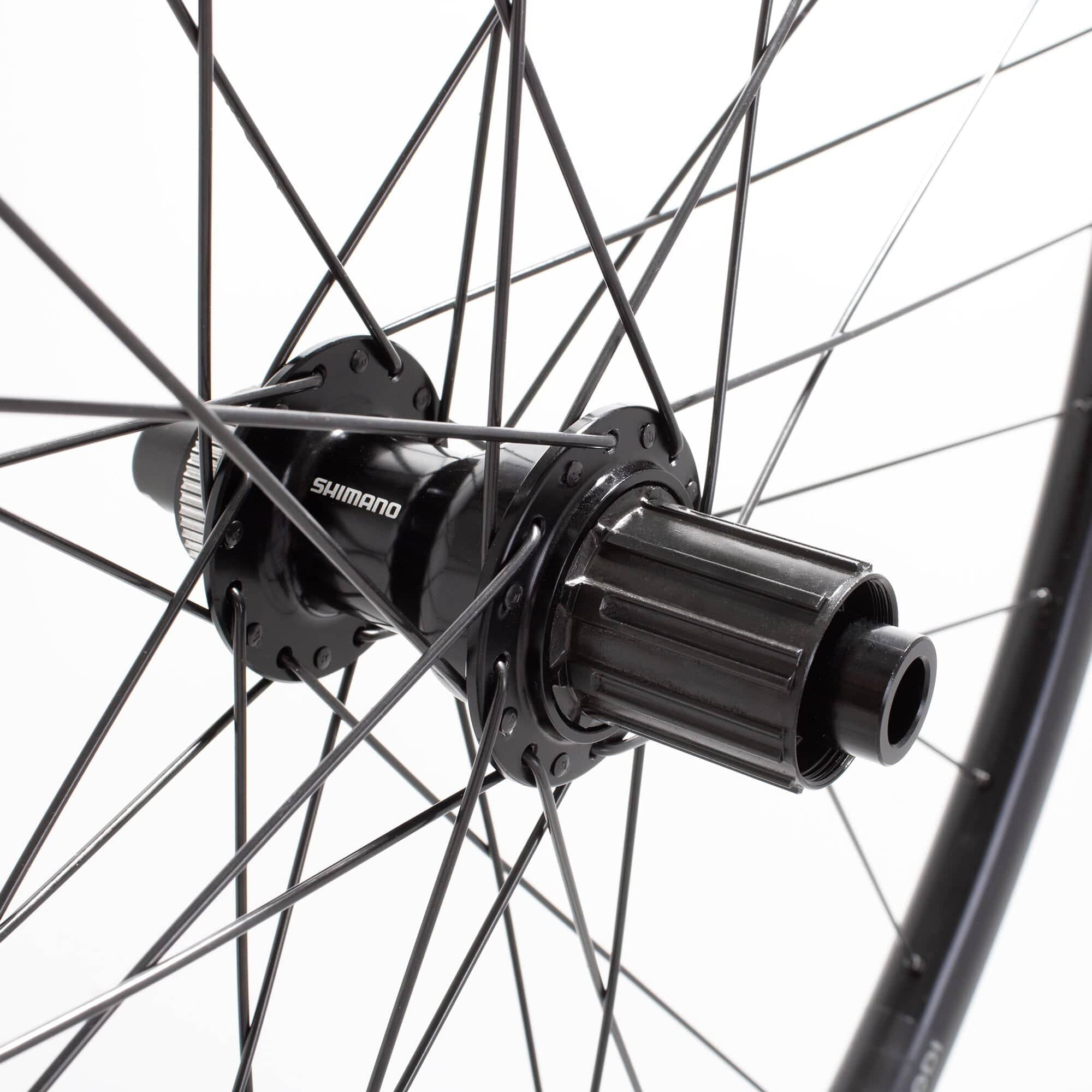 Black M Part Wheels gravel rear wheel with 700c rim, Shimano TC500 hub, Rodi Sniper rim, 24mm width, TA 142x12 axle.