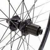 Black M Part Wheels gravel rear wheel with 700c rim, Shimano TC500 hub, Rodi Sniper rim, 24mm width, TA 142x12 axle.
