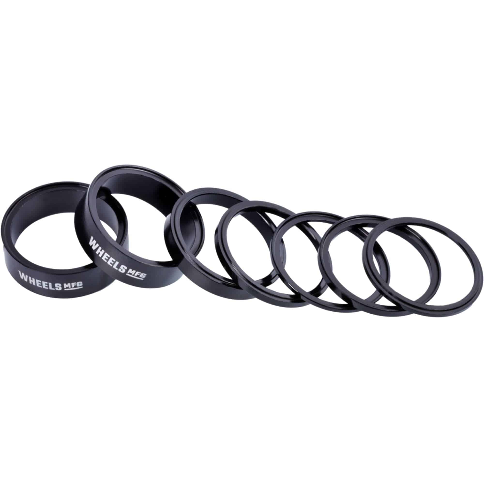 Wheels Manufacturing StackRight headset spacer kit for bike steering, includes various spacers for precise headset fitting.