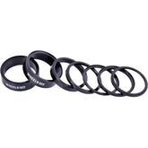 Wheels Manufacturing StackRight headset spacer kit for bike steering, includes various spacers for precise headset fitting.