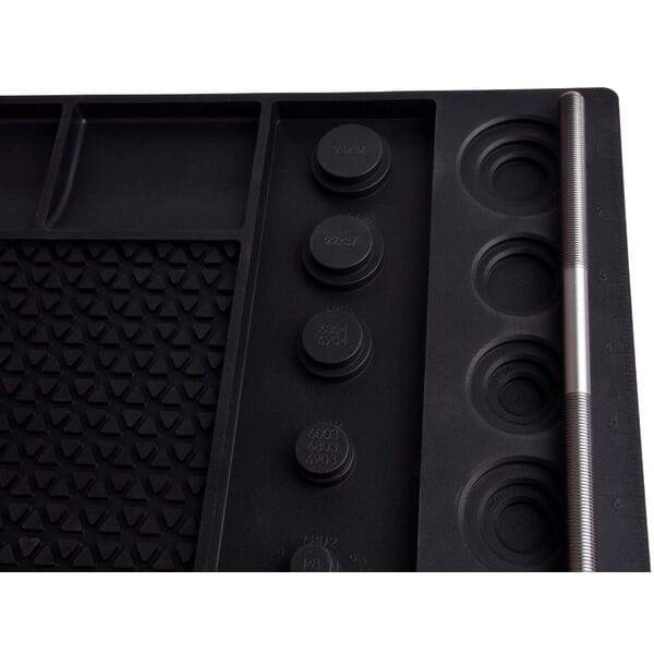 Wheels Manufacturing Ultimate Benchtop Workshop Mat with tool compartments and bearing gauges, durable and organized workspace accessory.
