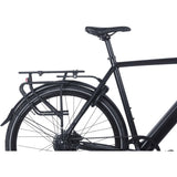 Basil Universal Cargo Carrier MIK STUDS in matte black attached to a 26-29 inch bike, showcasing bike rack accessories on a bicycle.