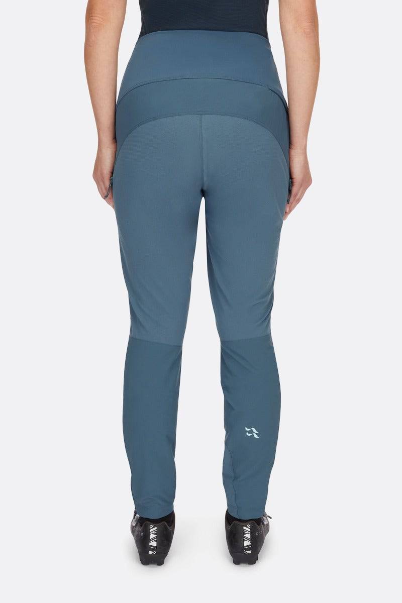 Back view of Rab Cinder Crank Women's Cycling Softshell Pants in Orion Blue, showcasing durable, breathable women's cycling trousers.