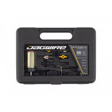 Jagwire Elite Mineral Oil Hydraulic Disc Brake Bleed Kit with syringes and bleed blocks for bicycle maintenance.