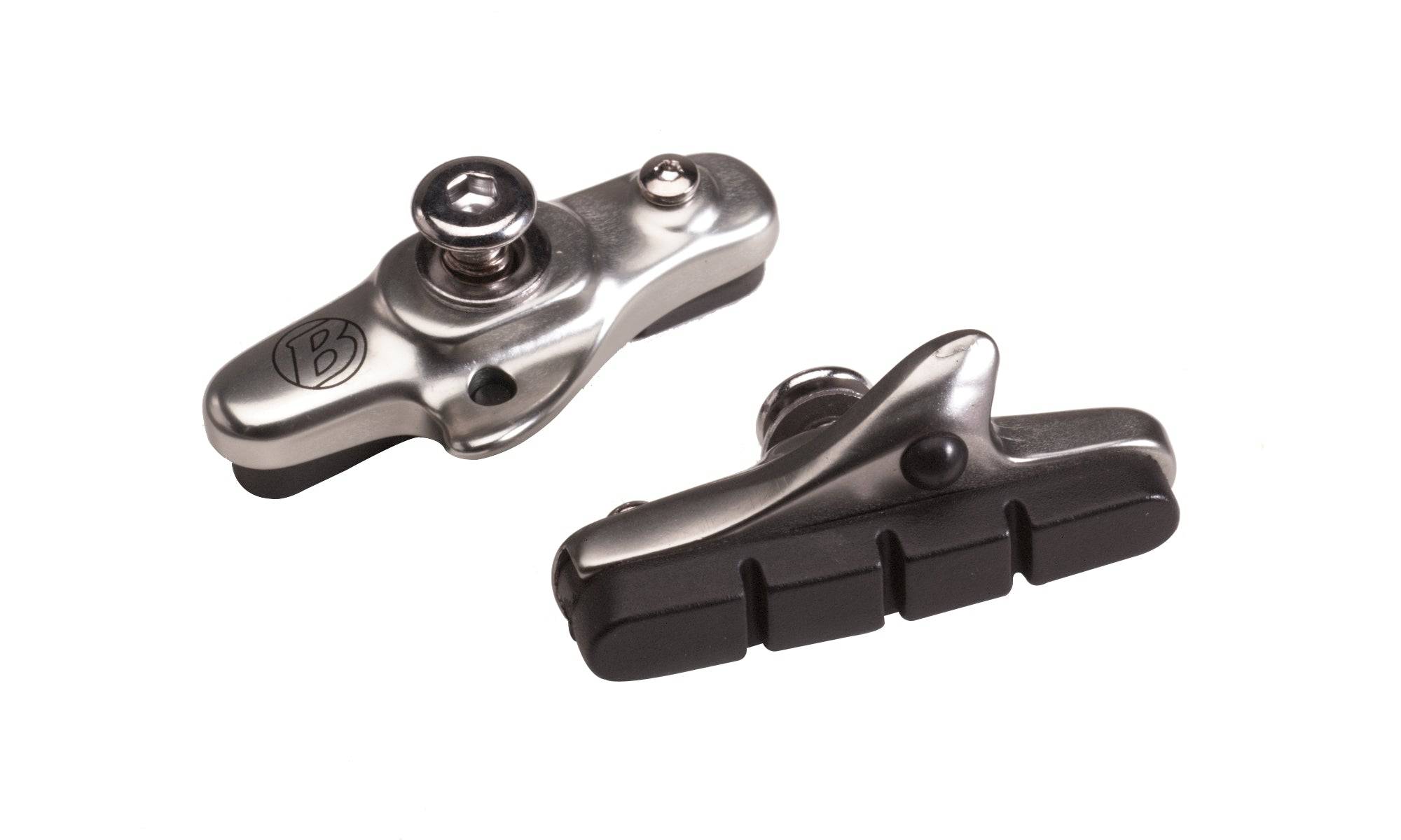 Pair of Bontrager road brake pad cartridges in black and grey, Shimano compatible, showcasing durable brake component design.
