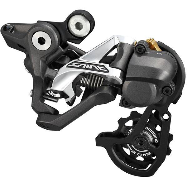 Shimano Saint RD-M820 10-speed rear derailleur with Shadow+ design and MTB direct mount, showcasing durable metal construction.