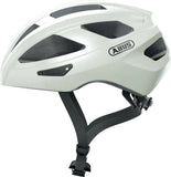 ABUS Macator Pearl White M cycling helmet with sporty design and ventilation for comfortable riding.