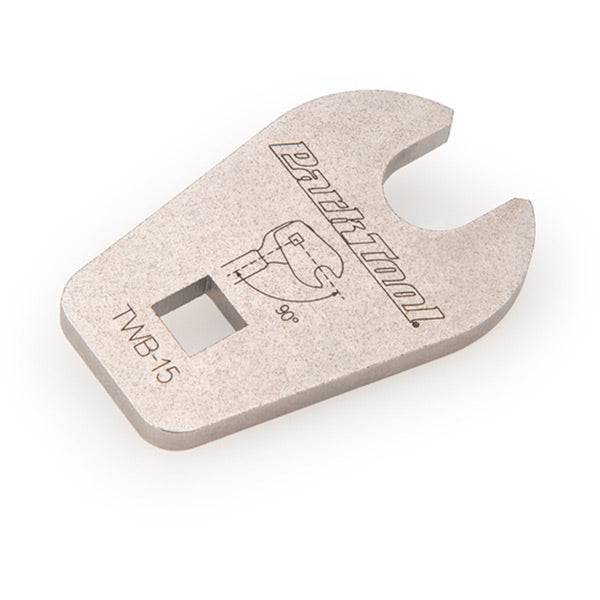 Park Tool TWB-15 15mm crow foot pedal wrench for 3/8 drive torque wrenches, shown in a workshop setting.