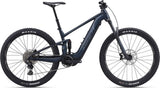 Giant Stance E+ 1 e-Mountain Bike with 29-inch wheels and SyncDrive Sport motor, shown from side view on rugged trail