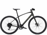 Trek FX Sport 5 hybrid bike with SRAM Apex drivetrain and hydraulic disc brakes, shown with sleek frame and ergonomic handlebars.