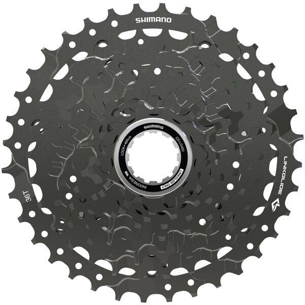 Shimano CUES CS-LG400-9 Link Glide 9-speed cassette for multi-purpose and e-bikes, showing silver metal cogs and branding.