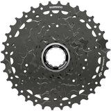 Shimano CUES CS-LG400-9 Link Glide 9-speed cassette for multi-purpose and e-bikes, showing silver metal cogs and branding.