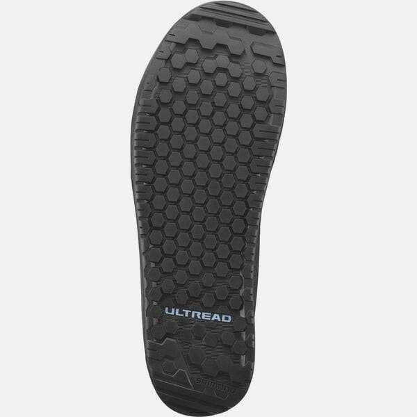 Shimano GF6 Gravel Shoes with ULTREAD® grip and TORBAL® 2.0 control, shown in a close-up of the sporty footwear.
