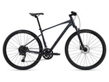 Giant Roam Disc 1 hybrid bike 2024 with Shimano CUES U6000 drivetrain and disc brakes, ready for versatile riding.