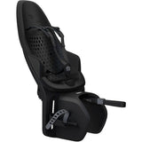 Black Thule Yepp 2 Maxi MIK HD child bike seat with click-in mounting system, designed for secure, comfortable bike riding.
