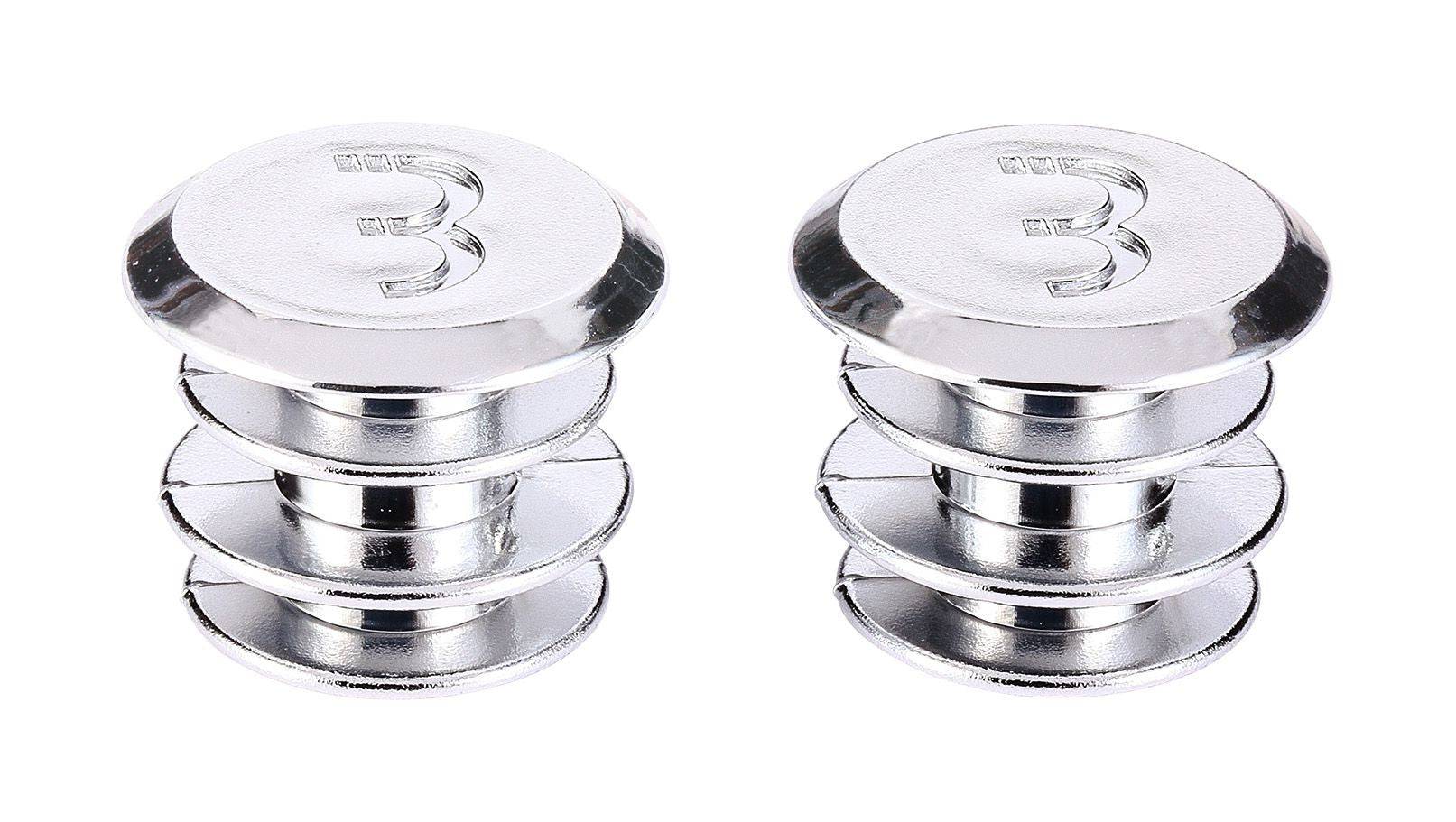 Pair of BBB BHT-90S silver end caps for handlebar tape, secure fit bike plugs, shown attached to bicycle handlebars.