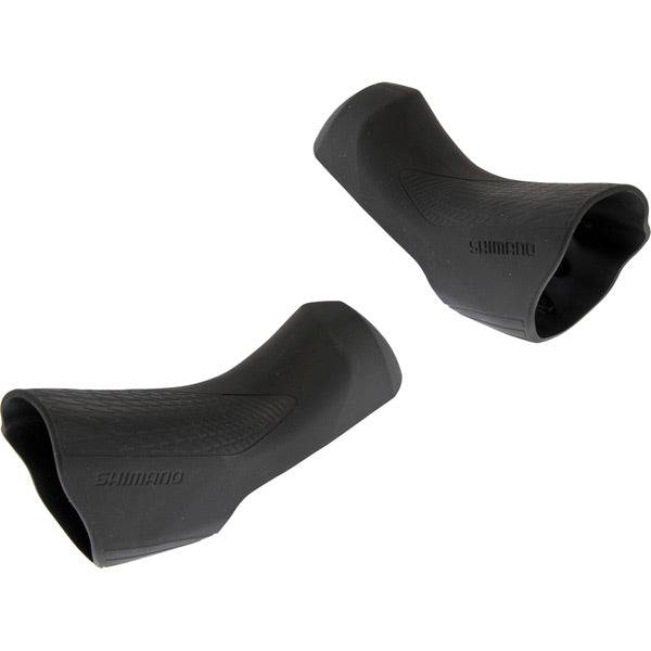 Pair of Shimano ST-R8000 shifter bracket covers, genuine replacement components for Shimano bike shifters.