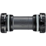 Shimano Ultegra BB-R60 bottom bracket for road bikes, featuring HollowTech II technology, installed in a bike frame.