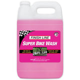Finish Line Super Bike Wash eco-friendly bike cleaner with rust protection, shown in a workshop setting with cleaning supplies.