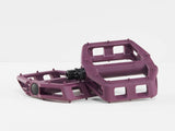 Bontrager Line Comp flat pedal with durable nylon body and traction pins for reliable grip, shown from an angle.