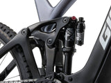 Giant Reign Advanced E+ 1 2026 electric mountain bike with SyncDrive Pro 3 motor and Maestro suspension, black and green frame.