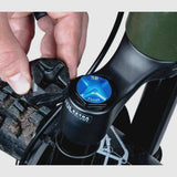 Park Tool FCT-1 fork cap tool for suspension forks, compatible with FOX, RockShox, DVO, Marzocchi, and Öhlins in a workshop setting.