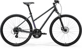Merida Crossway 10 Women's hybrid bike with Shimano 7-speed gears and disc brakes, featuring a lightweight frame and ergonomic design.