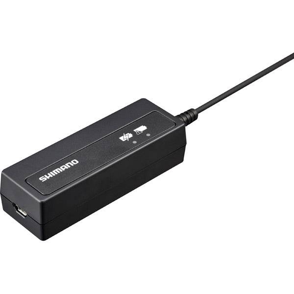 Shimano SM-BCR2 Di2 internal battery charger connected to SM-EW90 Junction for Shimano Di2 electronic shifting components.