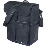 Basil Move Commuter Bicycle Bag in black with MIK studs, 15L capacity, laptop compartment, and rain cover, shown on a bicycle.