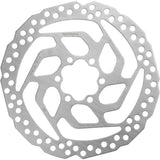 Shimano Acera SM-RT26 6-bolt disc brake rotor with mounting hardware for resin pads, shown on a bicycle wheel.