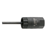 UNIOR cassette lockring tool with guide for precise installation and removal, used in bike workshop maintenance.