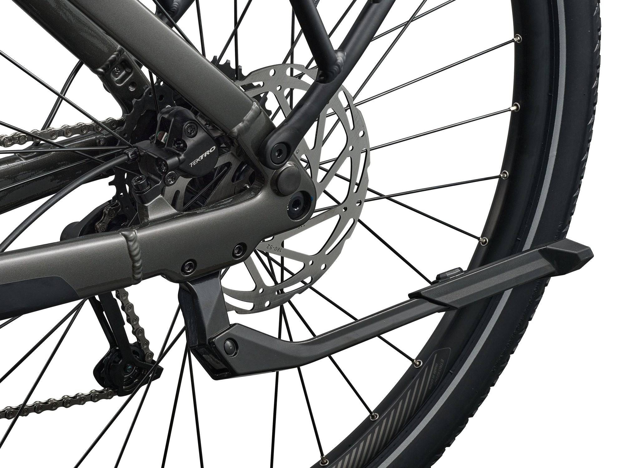 Giant Explore E+ 4 Stagger e-hybrid bike with Long-Range EnergyPak 800 battery and Aegis safety features, parked outdoors.