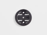 Bontrager Pro Blendr Garmin Adapter Puck in black for Blendr stem mounts, designed for easy Garmin device attachment.