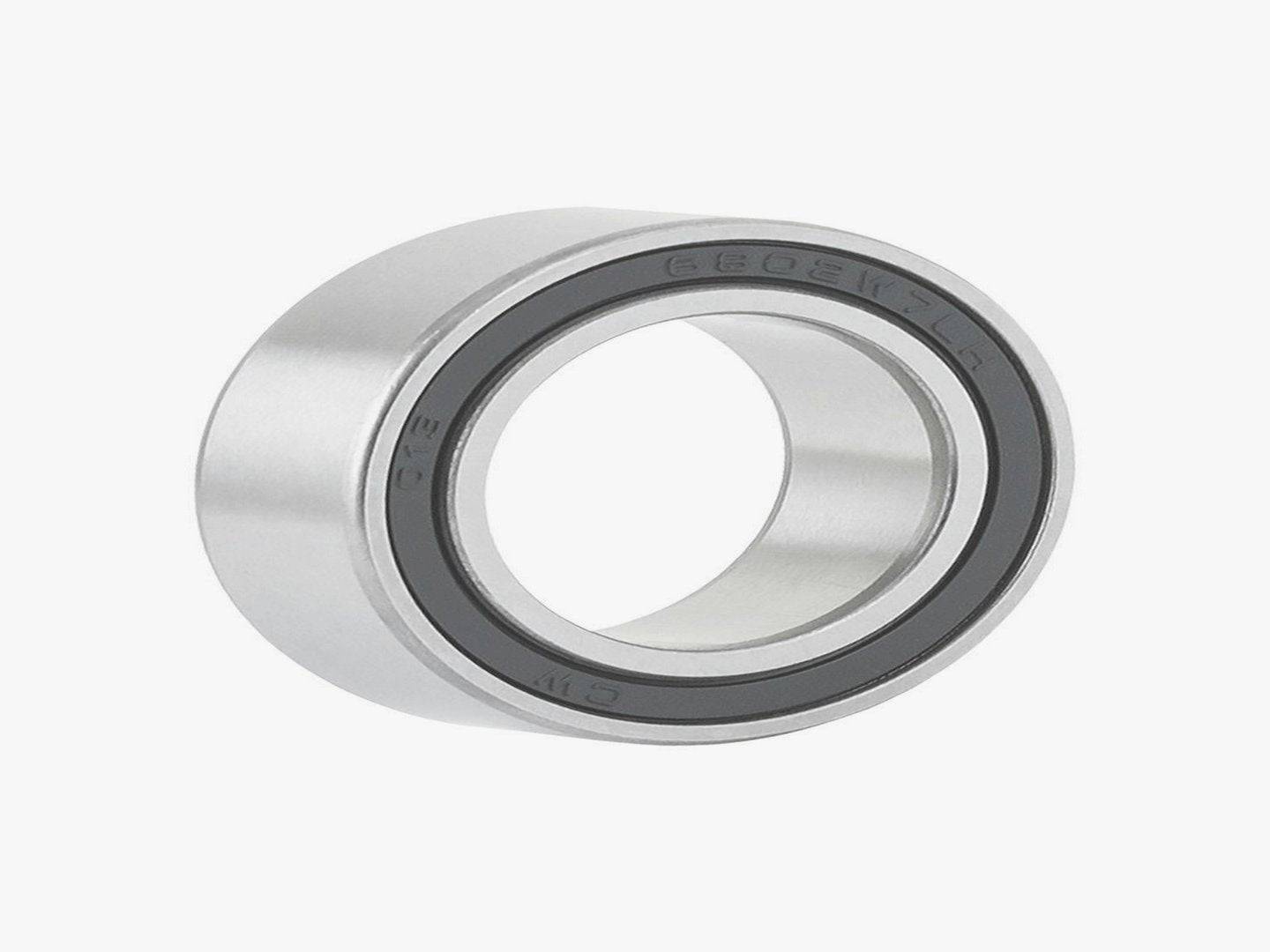 Silver Bontrager 3802 LLH bike hub bearing, durable replacement component, shown installed in a bicycle wheel hub.
