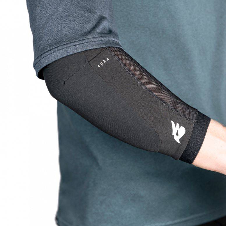 Bluegrass Aura Level 1 mountain bike elbow pads in blue, designed for trail and downhill protection, showing the padded protective gear