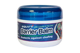 Squirt Barrier Balm for cycling and endurance athletes, anti-chafing skin protection, shown in a workshop setting.