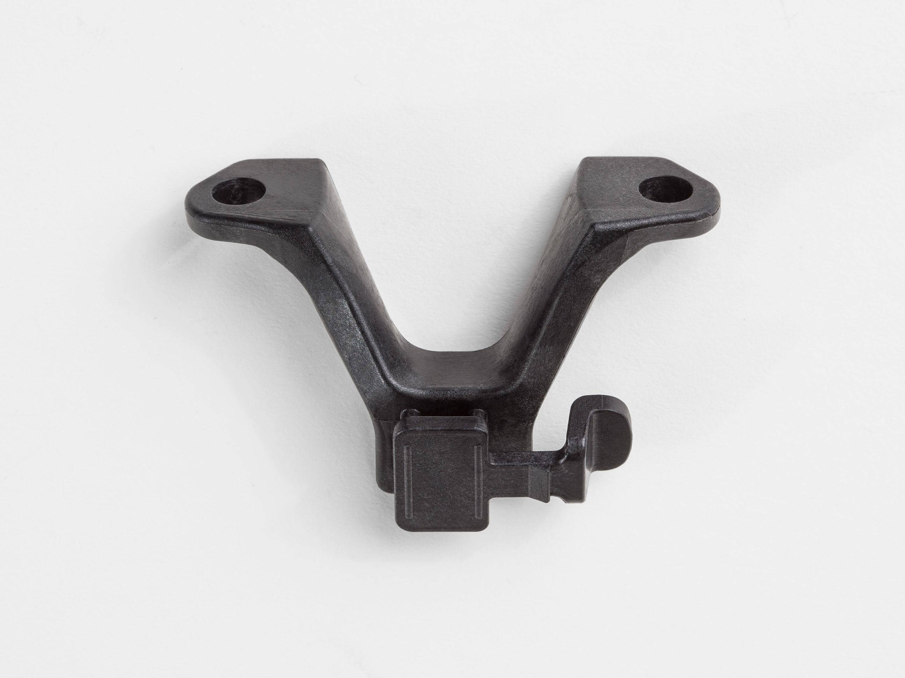 Bontrager Blendr saddle accessory mount in black and grey for bike lights, designed for easy attachment on bike saddles.