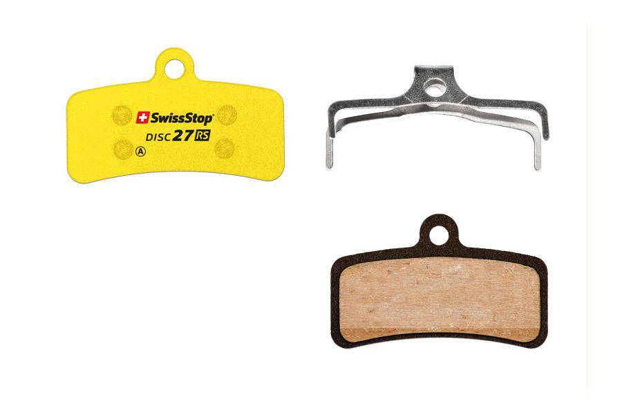 SwissStop Disc 27 brake pads for Shimano MTB ZEE, ZE, M8020 yellow disc brakes, close-up of yellow brake pad components.