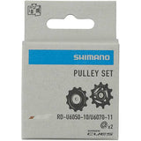 Shimano CUES MTB rear derailleur tension and guide pulley set, bike components for smooth gear shifting.