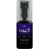 Finish Line Halo Wet Lubricant for bicycle chains, featuring Smart Luber™ technology, shown in a workshop setting.