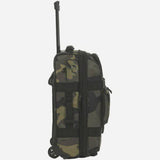 OGIO ONU-22 pannier bag with weather-resistant fabric, skateboard wheels, and expandable design for versatile accessories.