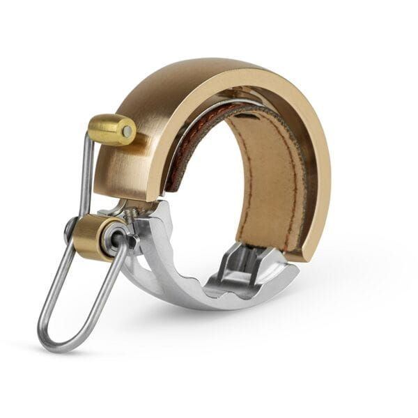 Knog Oi Luxe Bike Bell – Sleek, Low-Profile Handlebar Bell for Urban Cycling | Swinnerton Cycles