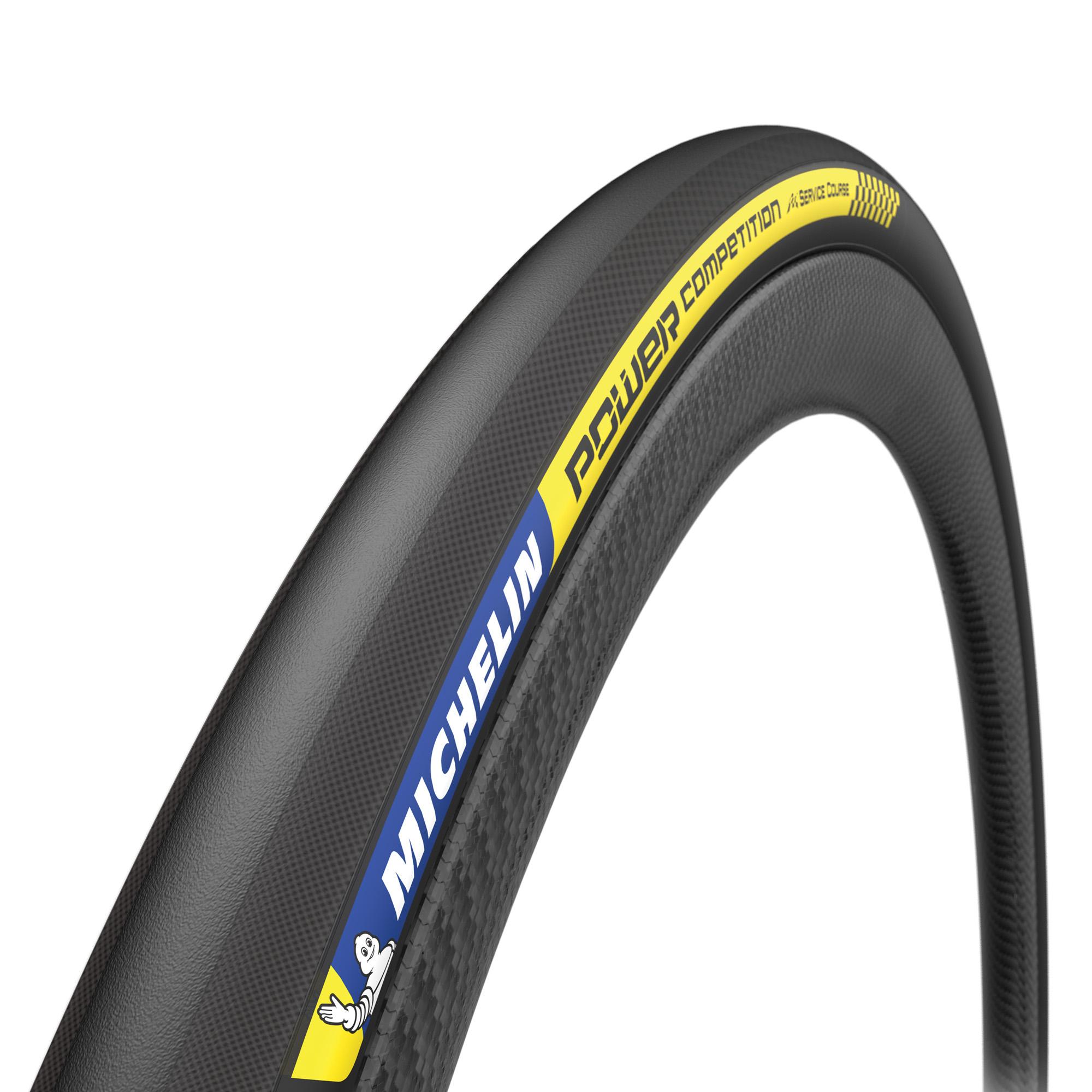 Michelin Power Competition tubular tyre for high-performance road cycling, showing the sleek black tire with branding on the sidewall.