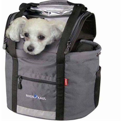 Rixen-Kaul 24L dog handlebar bag with leash, reflector, and detachable cover attached to a bicycle handlebar.